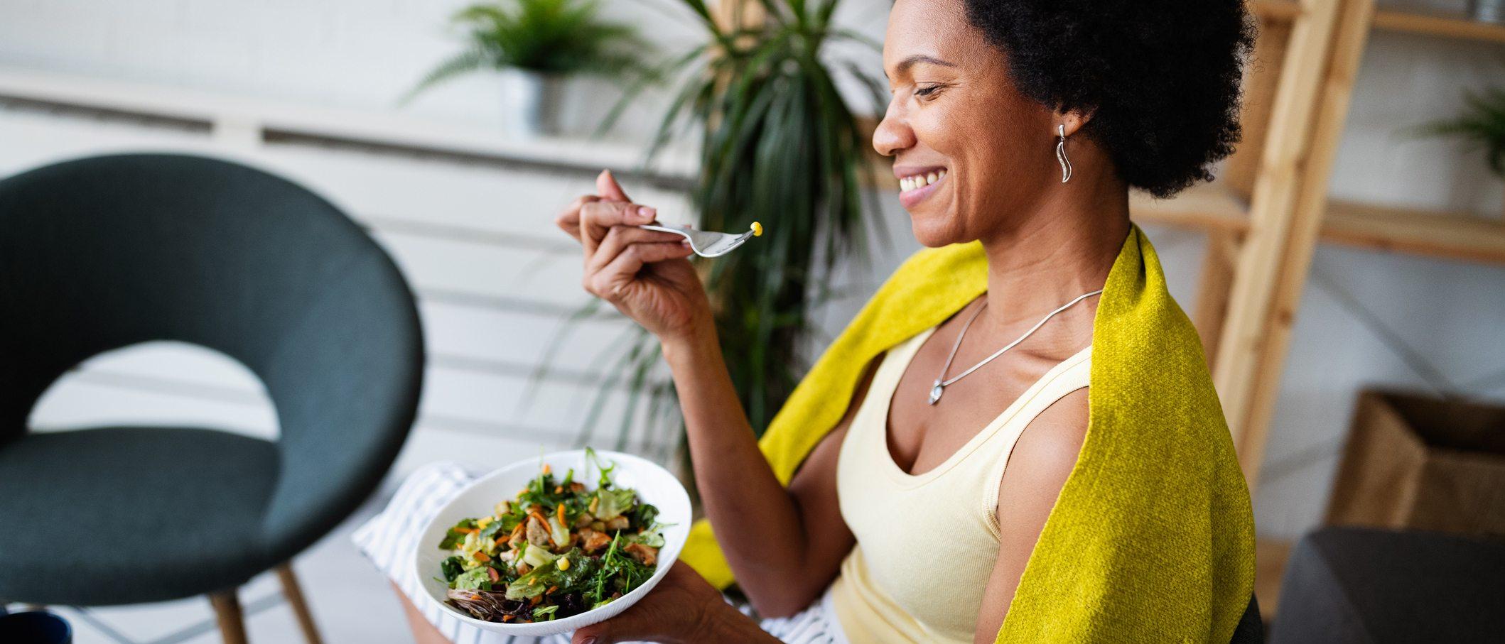 person eating a salad